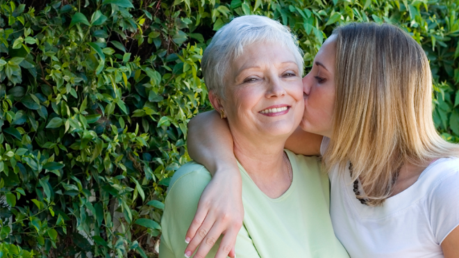 Elderly woman with hearing loss